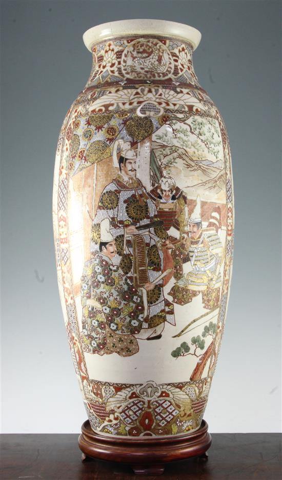 A large Japanese Satsuma pottery ovoid vase, late 19th century, 62cm, neck crack, wood stand